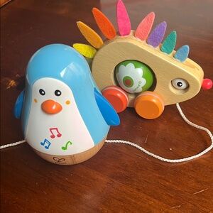 Hape musical wobbler Penguin and Janod pull along Hedgehog - Montessori Toy Set